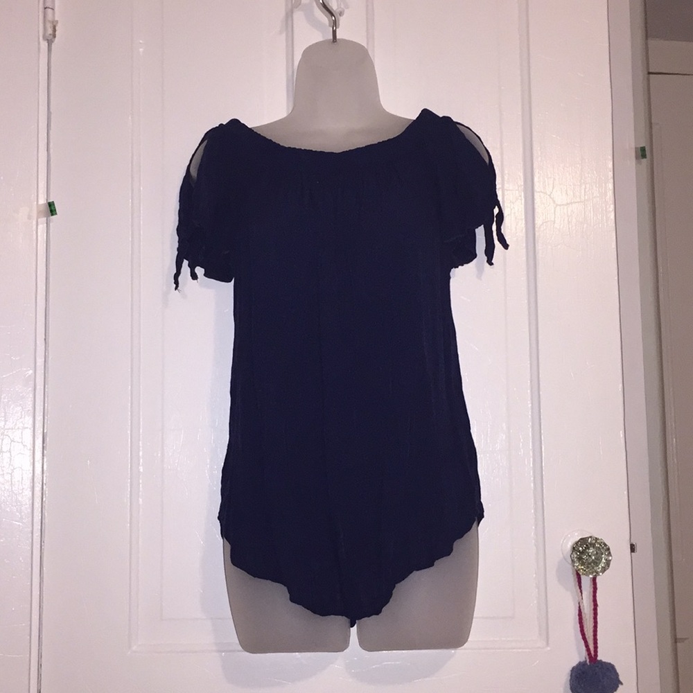 Loose fitting, off the shoulder blouse